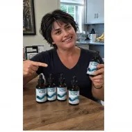 Rebecca H. verified Lymph Flow customer review — reduced bloating and lighter legs